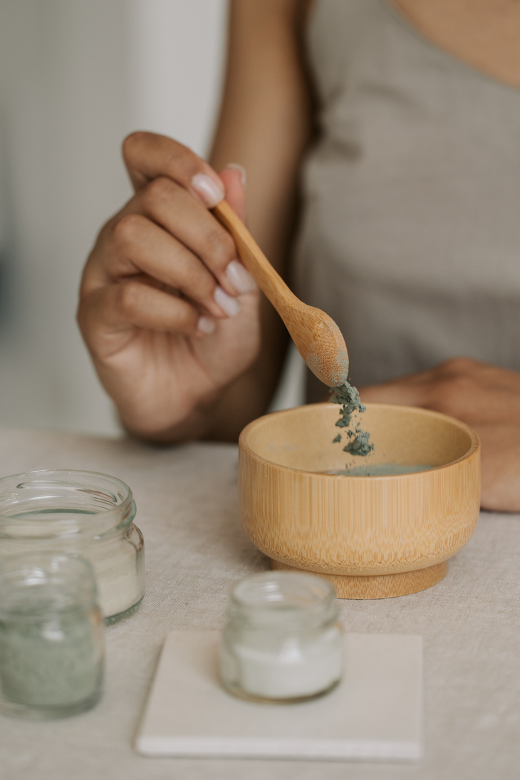 Woman Mixing Ingredients for Homemade Mask